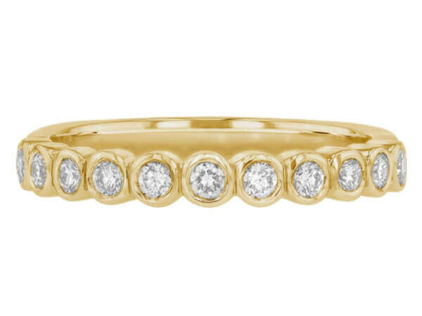 18ct yellow gold wedding band adorned with bezel-set round diamonds. Top view