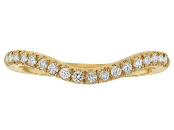 A stunning 18k yellow gold fitted diamond wedding ring featuring a beautifully curved band and claw set diamonds.