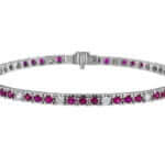 An 18k white gold Claw Set Ruby and Diamond Tennis Bracelet C926. This exquisite bracelet features claw-set rubies and diamonds, creating a dazzling display of elegance.