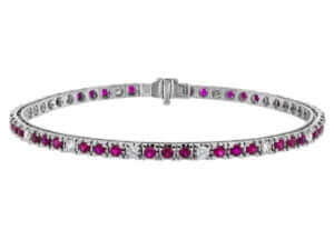 An 18k white gold Claw Set Ruby and Diamond Tennis Bracelet C926. This exquisite bracelet features claw-set rubies and diamonds, creating a dazzling display of elegance.
