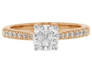 A stunning cushion cut diamond engagement ring crafted in the elegant hue of rose gold.