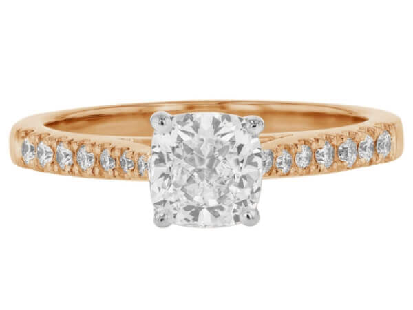 A stunning cushion cut diamond engagement ring crafted in the elegant hue of rose gold.