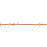 A bezel set rose gold bracelet adorned with diamonds .02ct and .05ct diamonds
