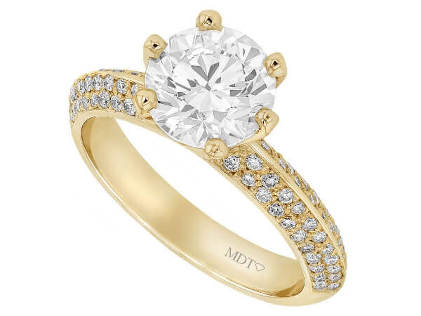 A stunning 18ct yellow gold engagement ring featuring a 2ct round brilliant cut diamond and pave diamond set shoulders