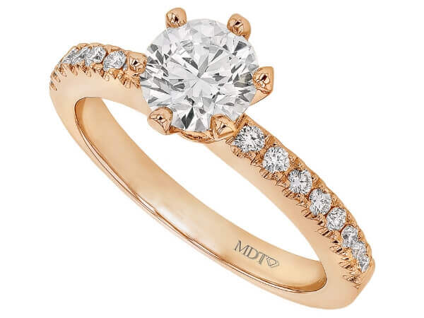 A round diamond engagement ring with a hidden halo in rose gold.