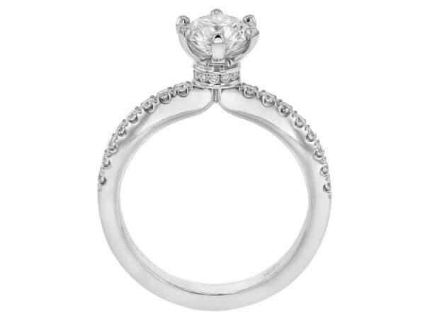 A white gold engagement ring with a diamond set in the center.