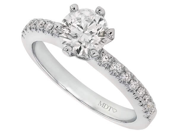 A round diamond engagement ring in white gold with a hidden halo.