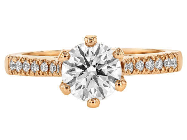 A stunning oval diamond engagement ring in 14k rose gold, featuring a hidden halo setting.