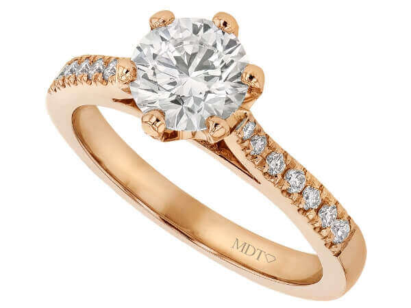 A gorgeous rose gold diamond engagement ring, featuring a hidden halo setting.