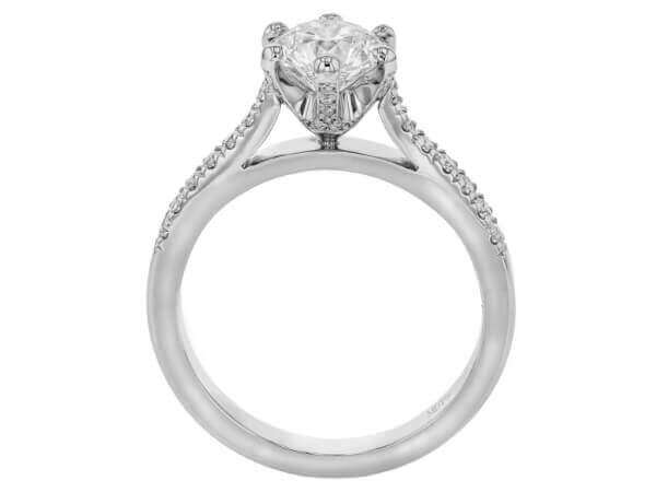 This Diamond Engagement Ring with Hidden Halo Setting C256 features an oval cut diamond in the center.