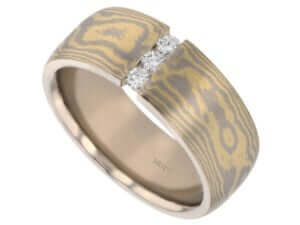 A Diamond Set Wide Mokume Gane Ring C722 with yellow gold and diamond set.