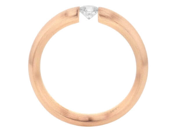 A stunning rose gold ring adorned with a mesmerizing diamond, elegantly crafted in a tension set.