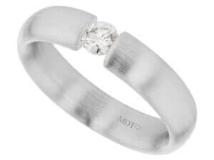 A tension set diamond engagement ring in white gold.