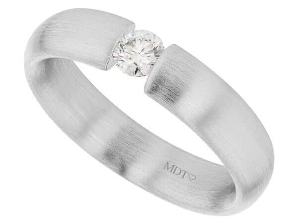 A tension set diamond engagement ring in white gold.