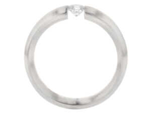 A Tension Set white gold ring with a diamond in the middle.