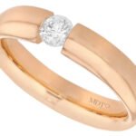 A Diamond Tension Set with Rounded Band and Polished Finish C015 in rose gold.