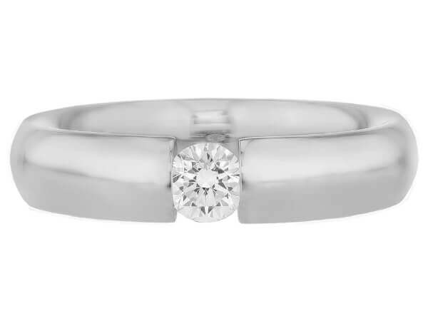 A tension-set white gold ring with a tension set round diamond, polished -top view