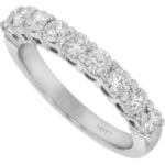 A Ladies Claw Set Diamond Wedding Ring C579 adorned with round diamonds.