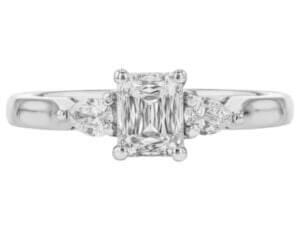 A stunning Emerald Cut Diamond Trilogy Engagement Ring with Pear Shapes C1236 with a white gold band -top view