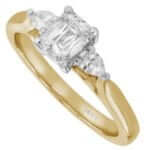 An emerald cut diamond trilogy engagement ring with pear shapes in yellow gold c1236