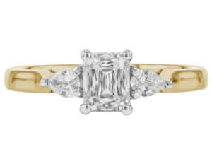 A stunning Emerald Cut Diamond Trilogy Engagement Ring with Pear Shapes C1236 with a yellow gold band -top view