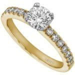 A round Four Claw Diamond Engagement Ring with Diamond Band C735 in yellow gold.