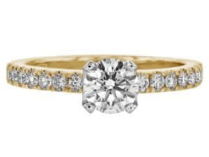 An oval Four Claw Diamond Engagement Ring with Diamond Band C735 in yellow gold.