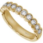 A Half Bezel Set Round Diamond Wedding Ring in yellow gold C273