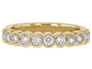 A Half Bezel Set Round Diamond Wedding Ring C273, yellow gold band with round diamonds.