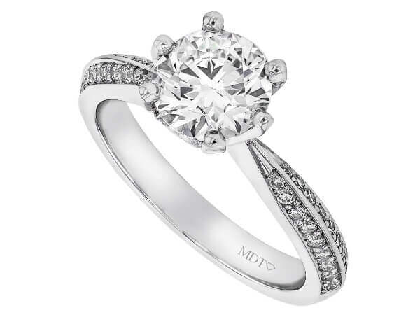 A white gold diamond engagement ring.