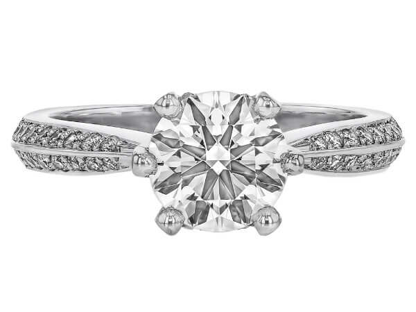 A white gold engagement ring with an oval cut diamond.