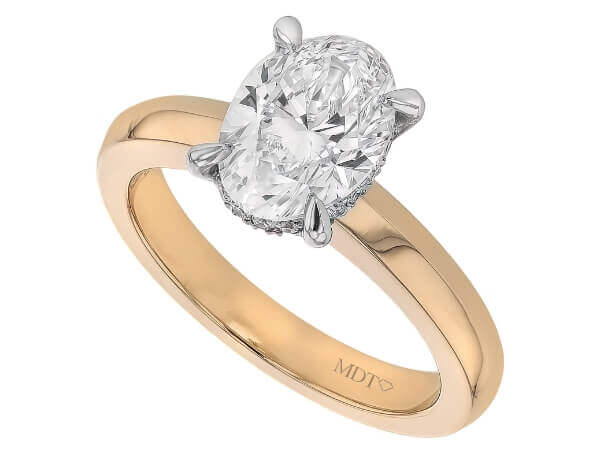 An exquisite Oval Diamond Engagement Ring with Diamond Hidden Halo C560 featuring a stunning oval cut diamond.