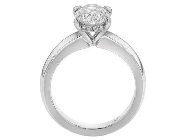A white gold oval diamond engagement ring.