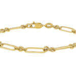 Marion's Marion Paperclip Gold Bracelet with a clasp resembles a delicate paperclip.