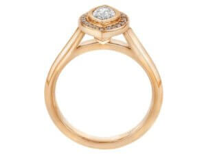 A marquise diamond halo engagement ring, plated in elegant rose gold.