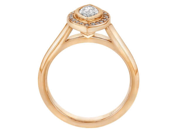 A marquise diamond halo engagement ring, plated in elegant rose gold.