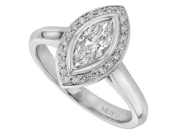 White gold halo engagement ring with a stunning marquise diamond centerpiece.