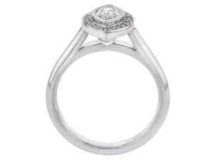 A white gold halo engagement ring with a marquise diamond.