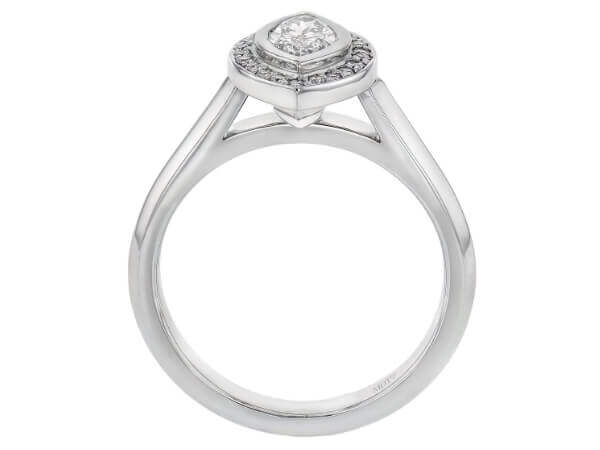 A white gold halo engagement ring with a marquise diamond.