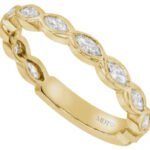 A yellow gold Marquise Diamond Wedding Band C1069 with diamond accents.