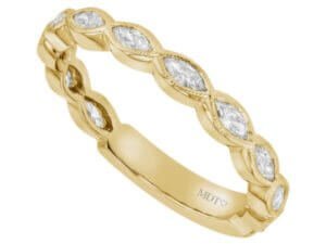 A yellow gold Marquise Diamond Wedding Band C1069 with diamond accents.
