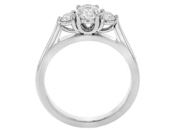 Oval diamond trilogy 3 stone engagement ring set in white gold. -Side view
