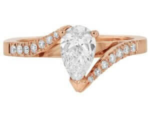 An 18ct rose gold swept band diamond engagement ring with a pear-shaped diamond. Top view
