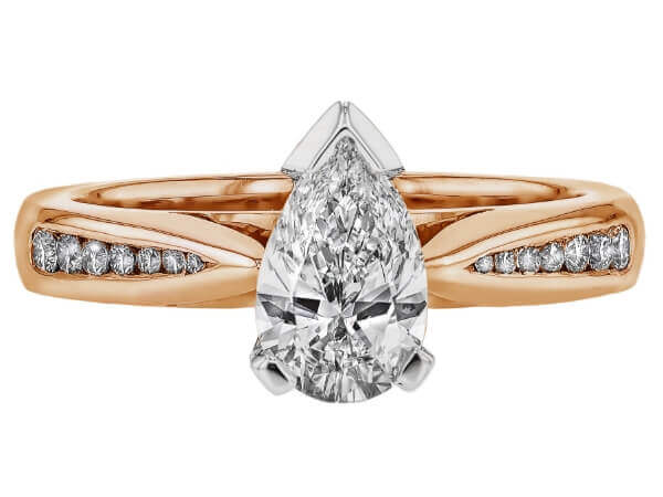 A Rose Gold engagement ring with a pear shaped diamond.