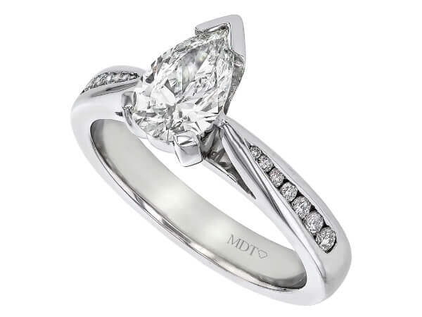 Pear shaped diamond engagement ring with channel set diamond band.