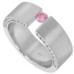 A white gold Tension Set Ring with a Pink Diamond Tension Set Ring with Diamonds on the Face of the Band C827 and diamonds.