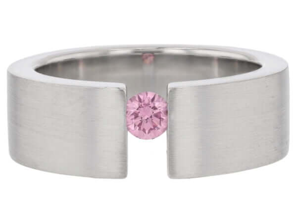 A Pink Diamond Tension Set Ring with Diamonds on the Face of the Band C827 with a pink sapphire in the middle.