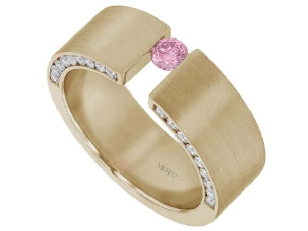 A yellow gold tension set ring featuring a radiant pink sapphire and sparkling diamonds.