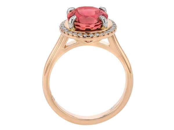 A Pink Tourmaline and Diamond Halo Engagement Ring C1249 with diamonds.