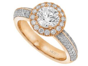 A Rose Gold Halo Engagement Ring with a Round Diamond